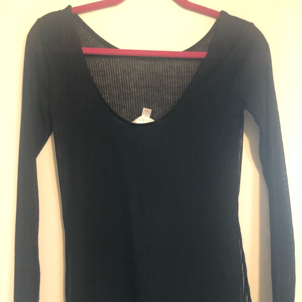 Black long sleeve top slit on the side